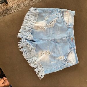 Distressed Denim Fringe Shorts